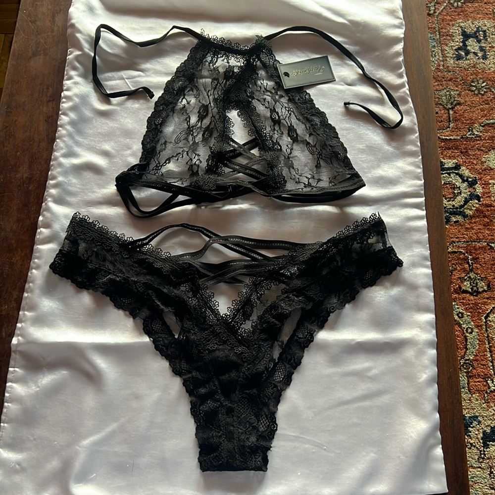 Lacy halter bra & panty set, Fredrick’s of Hollywood. New with tags. Never worn.